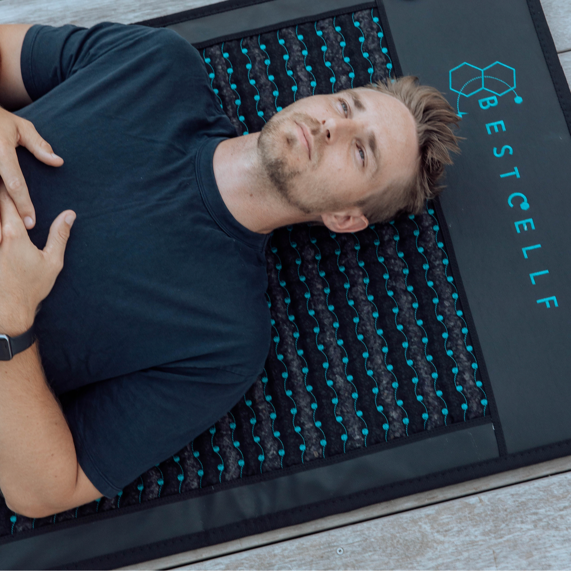 Nick on the Infrared PEMF Mat in Black