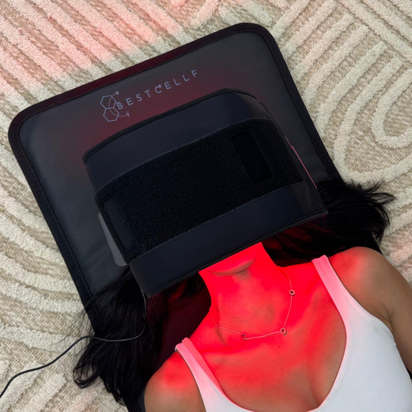 Steph using the NIR red light wrap whilst on the compact mat