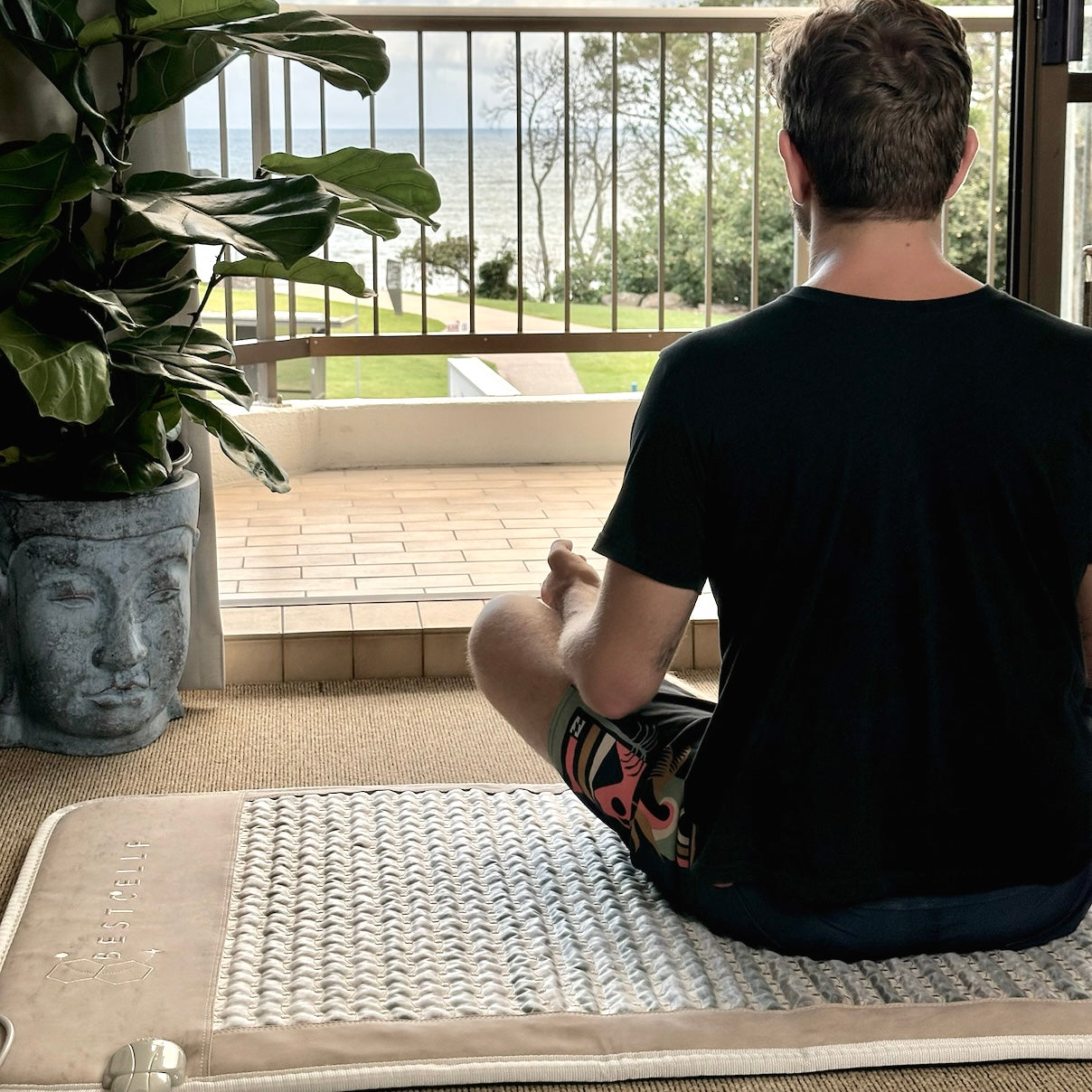 Filipe Meditating on Infrared PEMF Mat
